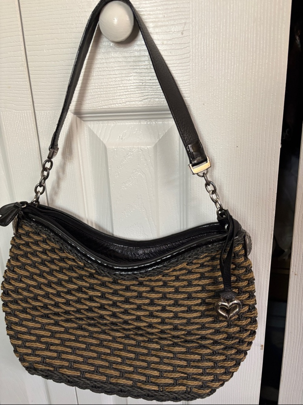 Woven Straw-Style Shoulder Bag with Black Trim.